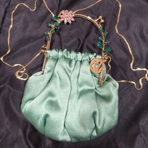 Elegant Green Satin Clutch with Gold Accents